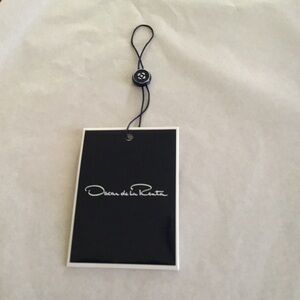 OSCAR DE LA RENTA ENVELOPE CARD DESCRIPTION